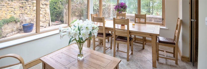 A secure, solid orangery adds light and all-year-round living space Photo of an Oldfield orangery